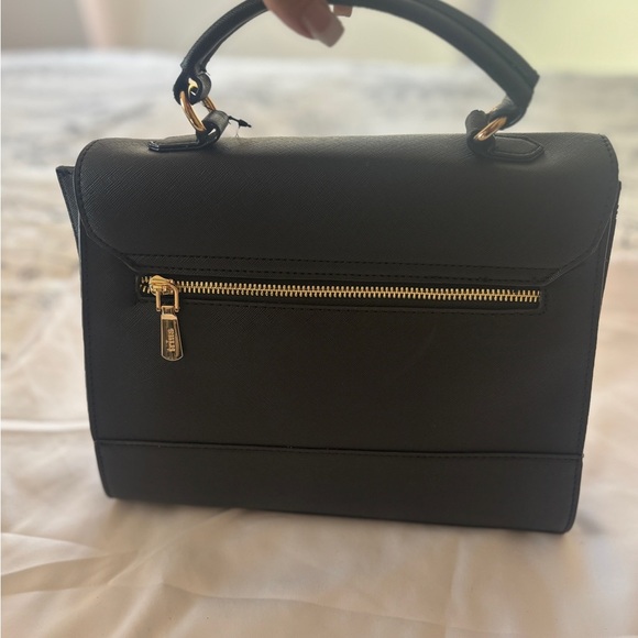 Sleek Sophisticated Trina Turk Black Handbag or Crossbody with Gold Hardware - Picture 5 of 11